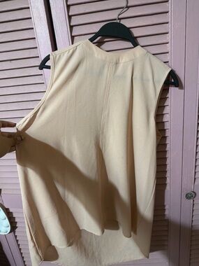 Paper Crane Sleeveless Cream Blouse with Soft Drape
